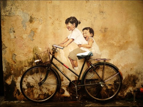Little children on a bicycle, Georgetown, Penang, Malaysia